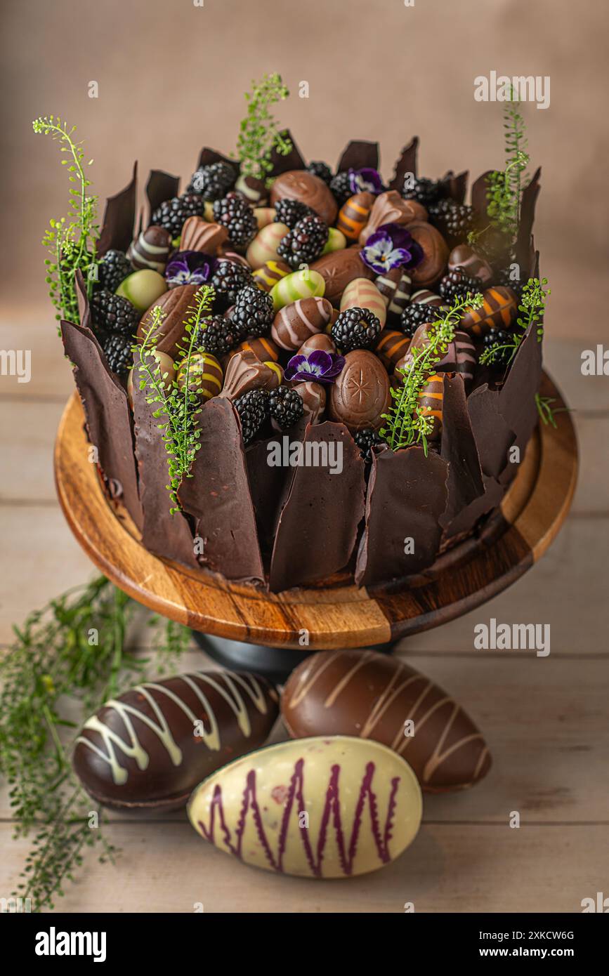 Easter chocolate cake. Beautifully decorated on the table with easter eggs. Stock Photo