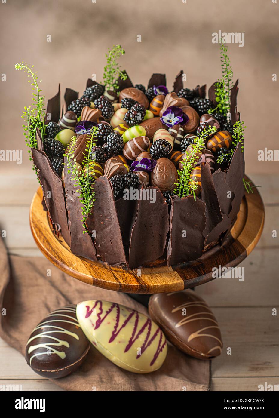 Easter chocolate cake. Beautifully decorated on the table with easter eggs. Stock Photo