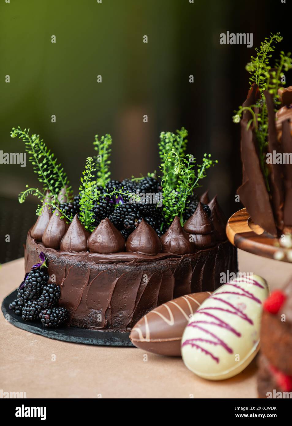 Easter chocolate cake. Beautifully decorated on the table with easter eggs. Stock Photo