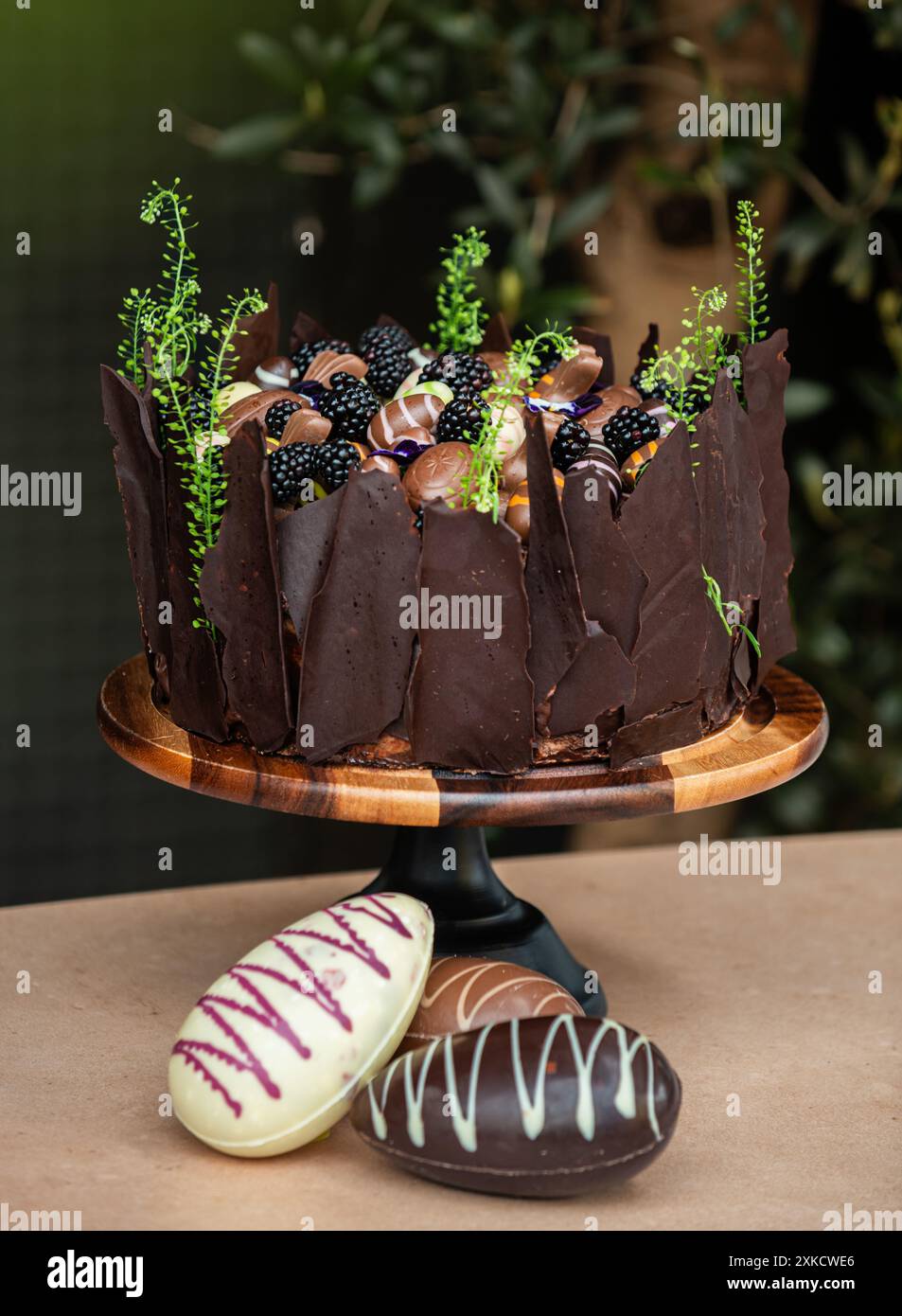 Easter chocolate cake. Beautifully decorated on the table with easter eggs. Stock Photo