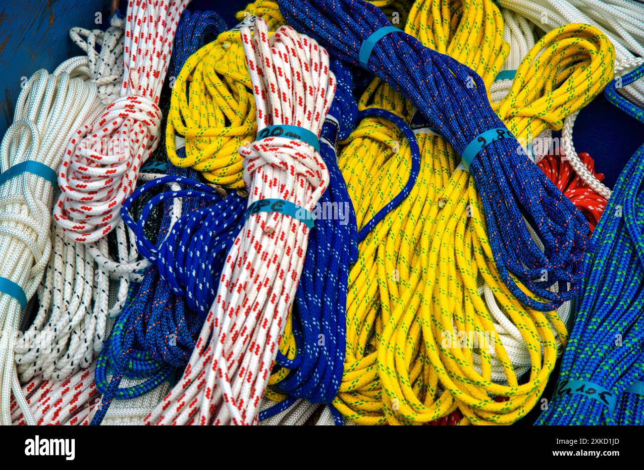 Hanks of modern multi-coloured rope at a maritime market stall ...