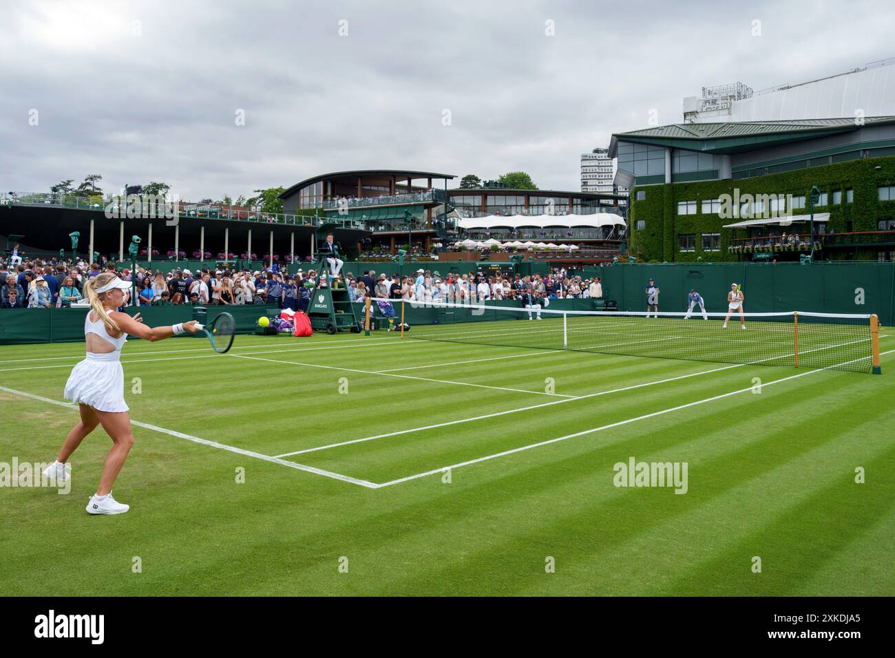 General view of Court 6 as Donna Vekic (CRO) takes on Xinyu Wang (CHN) in the Ladies' Singles at The Championships 2024, Wimbledon. Stock Photo