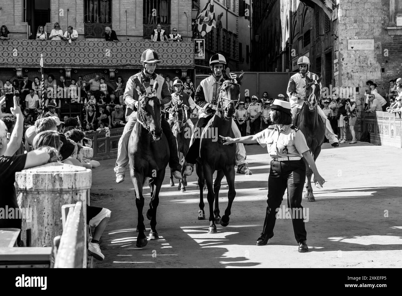 Jockeys Wearing Their Contrada Colours Approach The Start Line For The ...