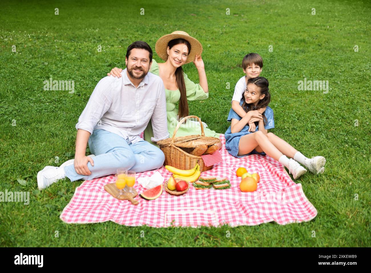 Family boy picnic basket eating hi-res stock photography and images - Alamy