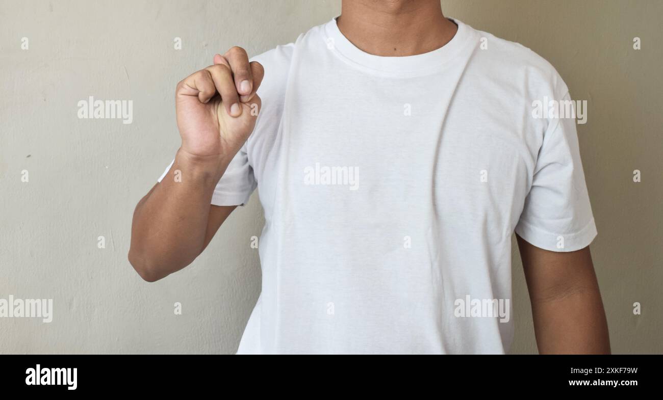 A Man hand raise while showing letter n using deaf alphabet Stock Photo