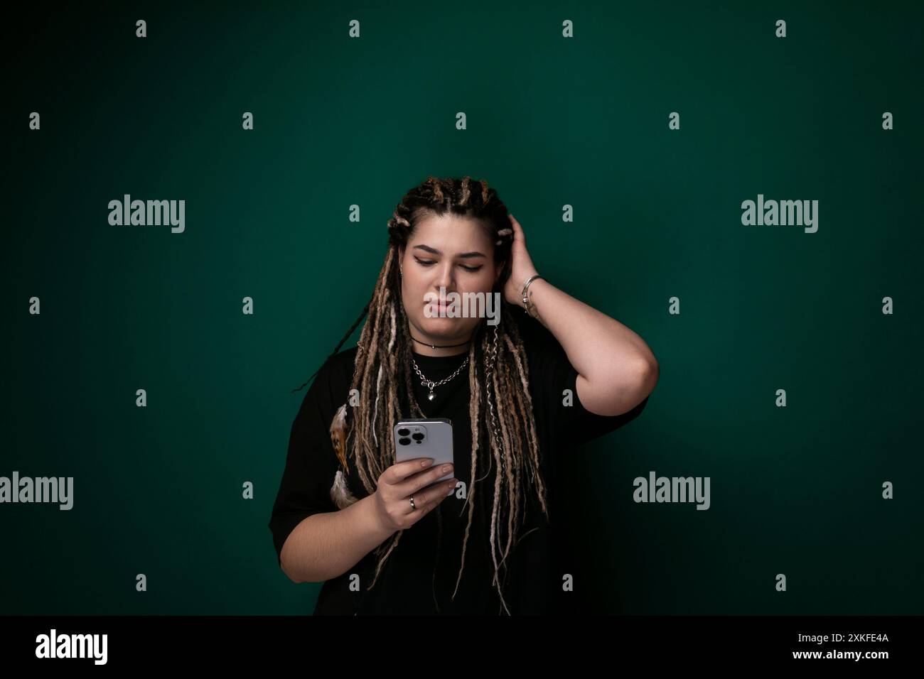 Focused black woman dreadlocks hi-res stock photography and images - Alamy