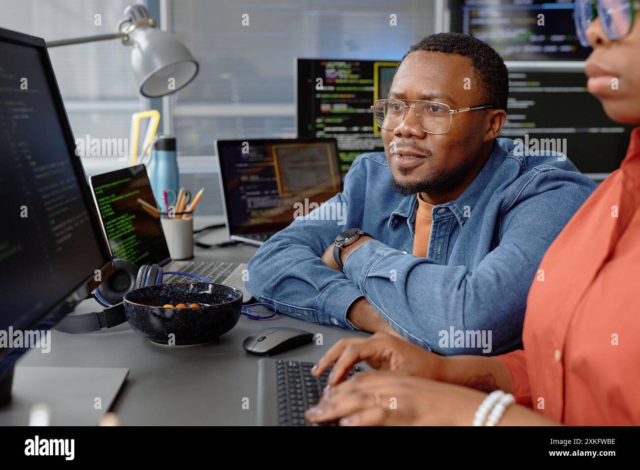 Pensive young african american programmer hi-res stock photography and ...