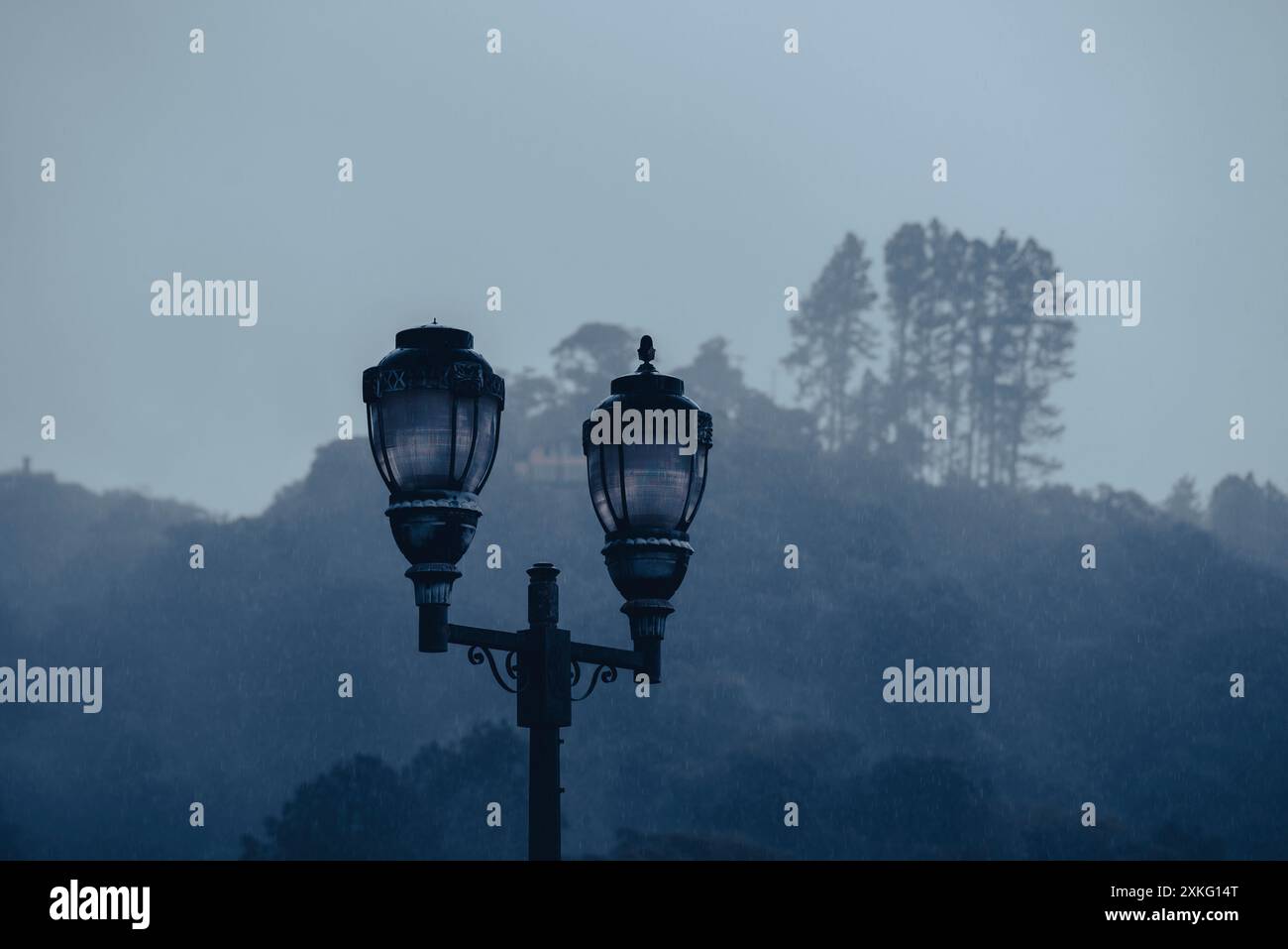 Two street lanterns in rain, Boquete, Province of Chiriquí, Panama Stock Photo
