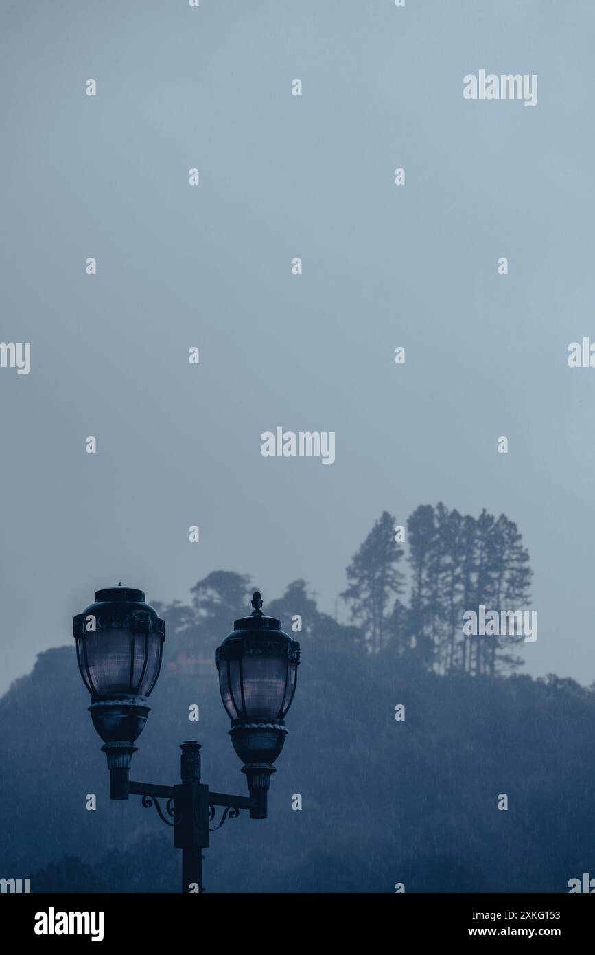 Two street lanterns in rain, Boquete, Province of Chiriquí, Panama Stock Photo