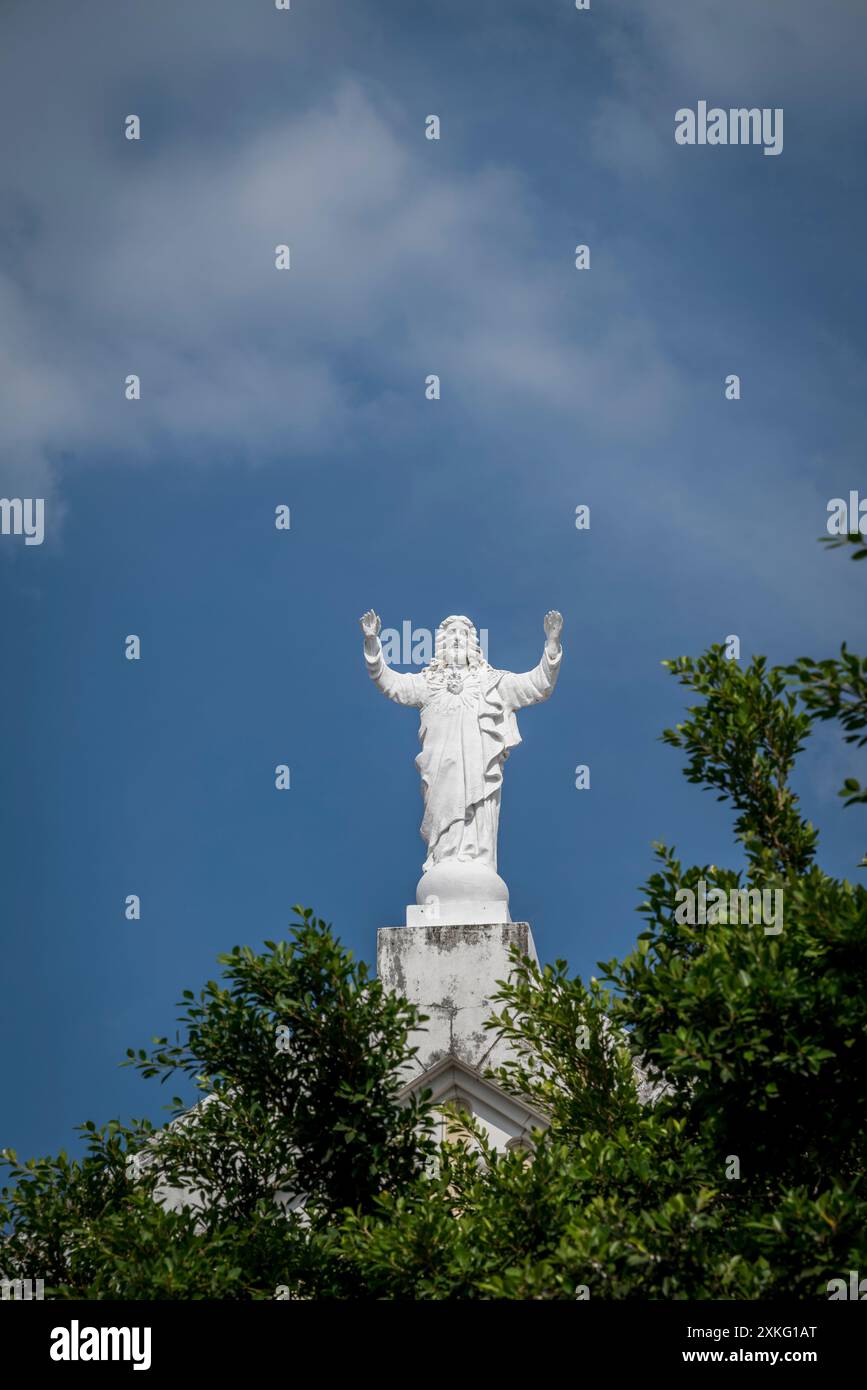 Figure of Christ redeemer on top of Church of Saint Francis of Assisi, Casco Viejo, the old city centre, Panama City, Panama Stock Photo