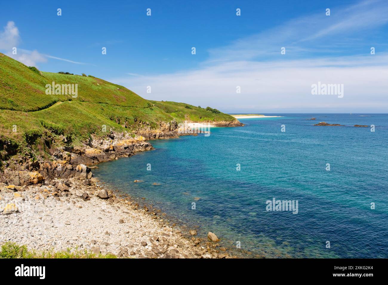 View to distant Shell beach with the coastal path along the rocky east ...