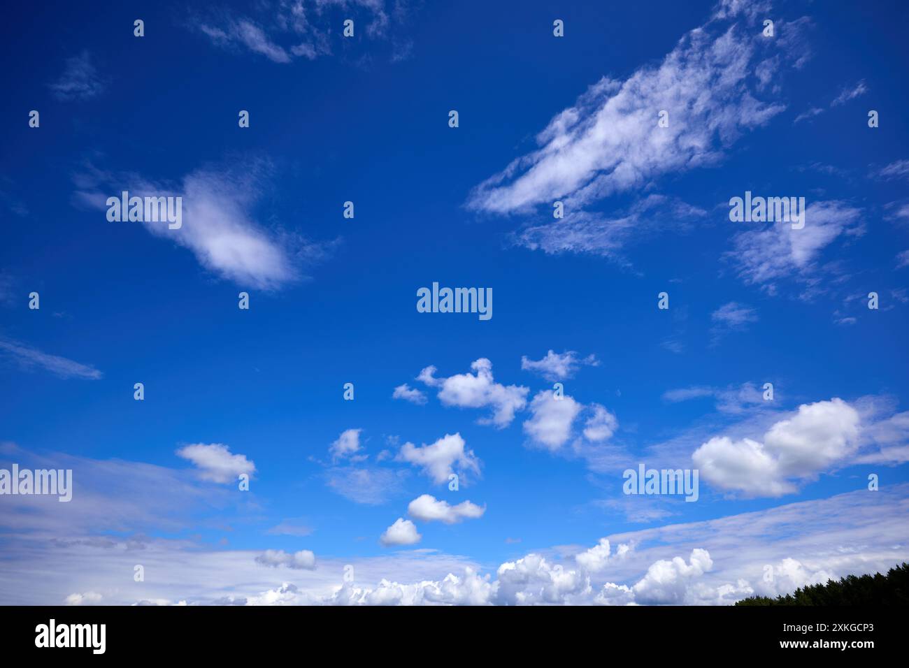 Blue sky background with white clouds at sunny day Stock Photo - Alamy