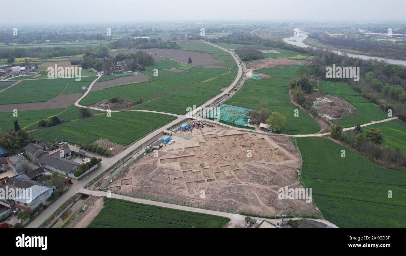 (240723) -- CHENGDU, July 23, 2024 (Xinhua) -- An aerial drone photo taken on March 23, 2024 shows a view of the Sanxingdui Ruins site in Guanghan City, southwest China's Sichuan Province. Archaeological authorities have recently unveiled groundbreaking discoveries, including a jade and stone artifact "workshop" dating back over 3,400 years, at the legendary Sanxingdui Ruins site. The new finds offer vital insights into the origins of various precious cultural relics and highlight the remarkable achievements of ancient Chinese civilization. (Sichuan cultural relics and archaeology research ins Stock Photo