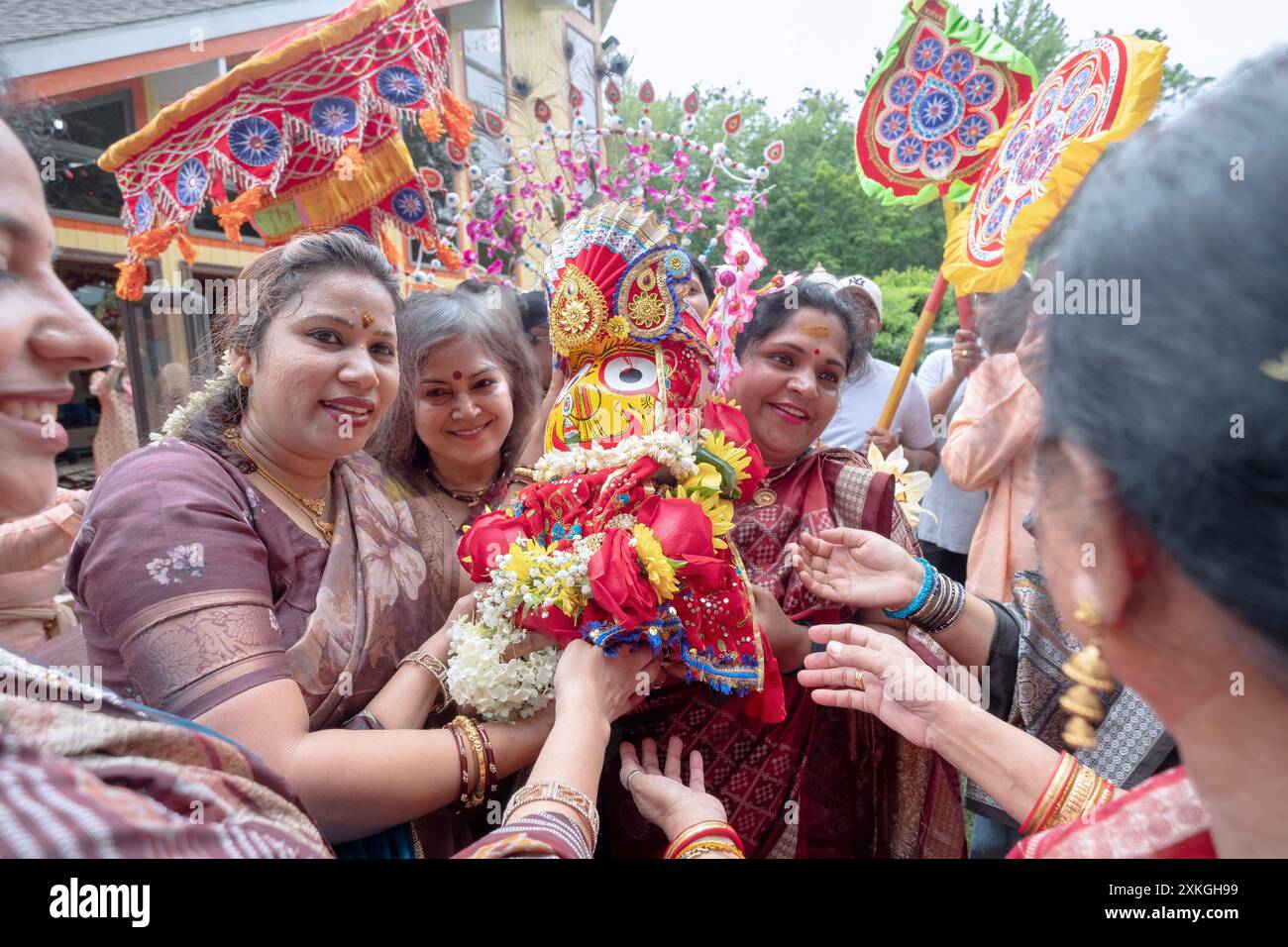 Before the Ratha Yatra Parade a group of devout men & women carry a statue of Subhadra a sister of Krishna. In Wilton, Connecticut, 2024. Stock Photo