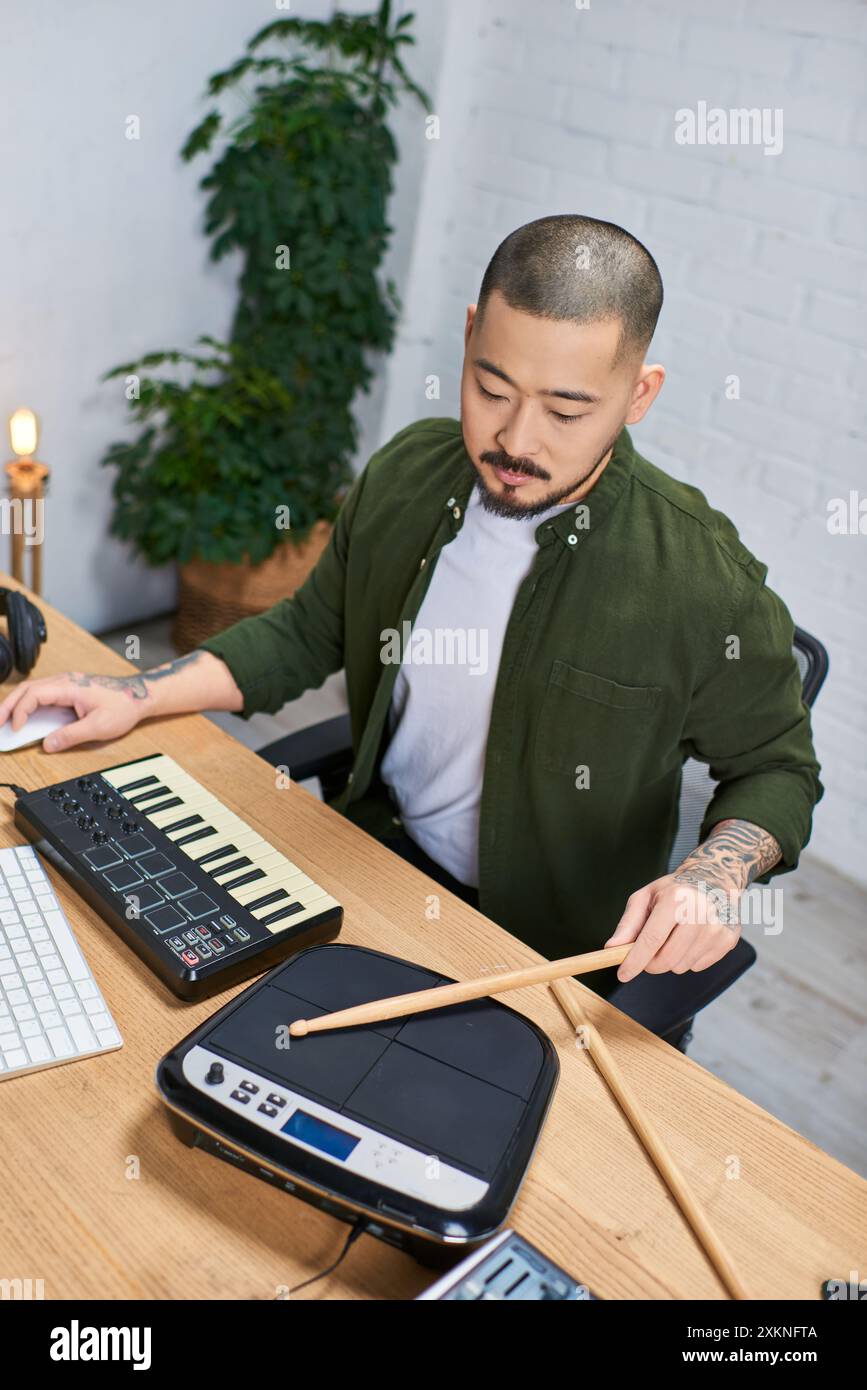 Handsome man with drumsticks hi-res stock photography and images - Alamy
