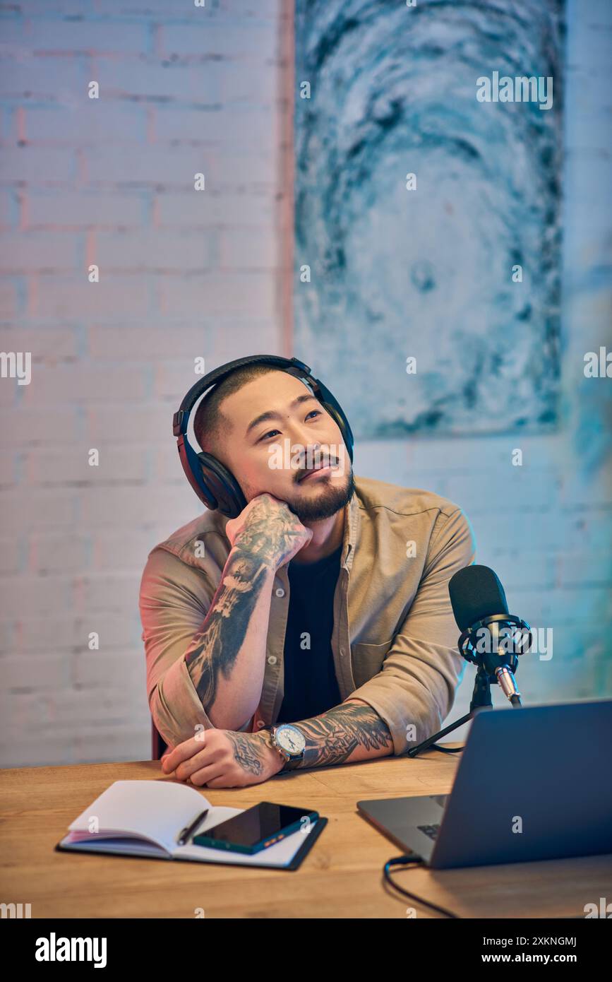 Asian man wearing tan shirt hi-res stock photography and images - Alamy