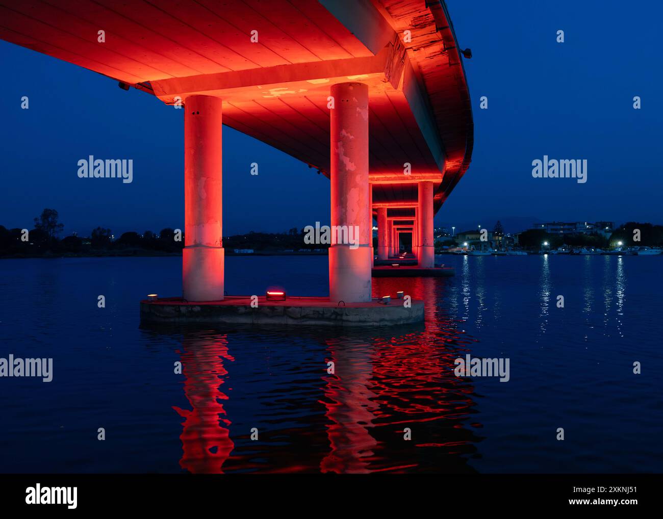 Bridge lit up red in olbia stock photo alamy