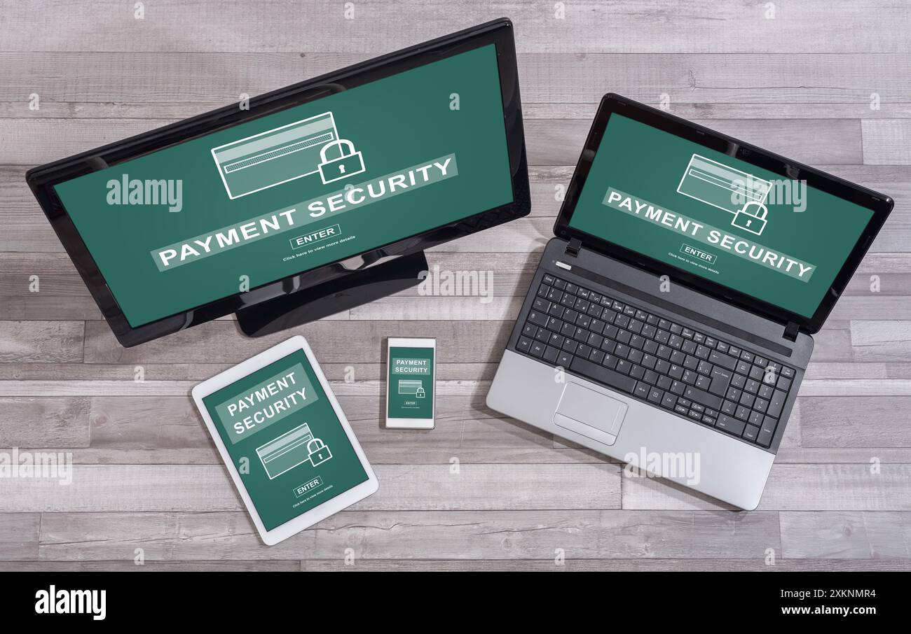 Payment security concept shown on different information technology devices Stock Photo
