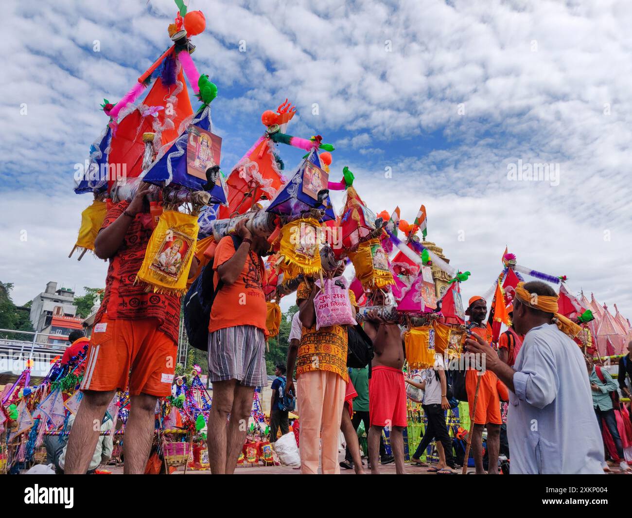 Hindu pilgrim going for kanwar yatra barefoot to worship lord shiv at har ki paudi, haridwar. Stock Photo