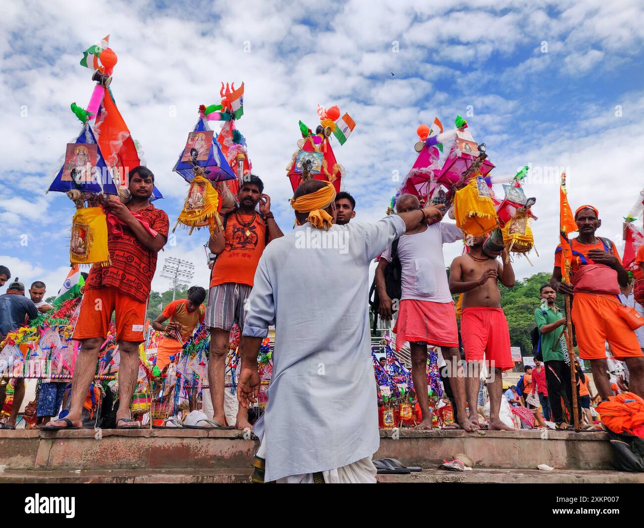 Hindu pilgrim going for kanwar yatra barefoot to worship lord shiv at har ki paudi, haridwar. Stock Photo