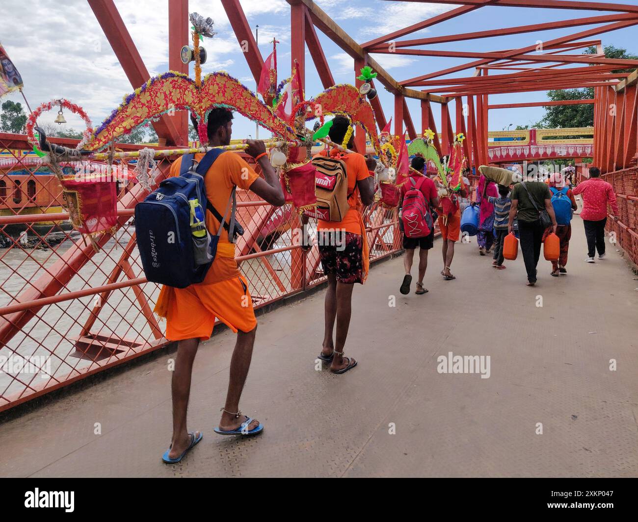 Hindu pilgrim going for kanwar yatra barefoot to worship lord shiv at har ki paudi, haridwar. Stock Photo
