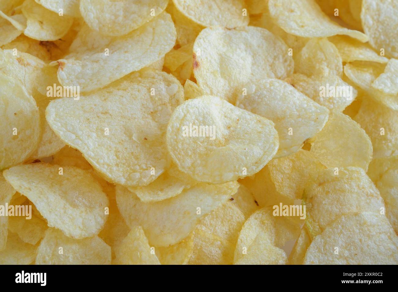 crispy potato chips snack texture background Stock Photo - Alamy