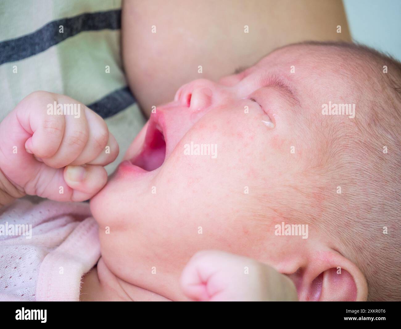 newborn baby girl crying Stock Photo - Alamy
