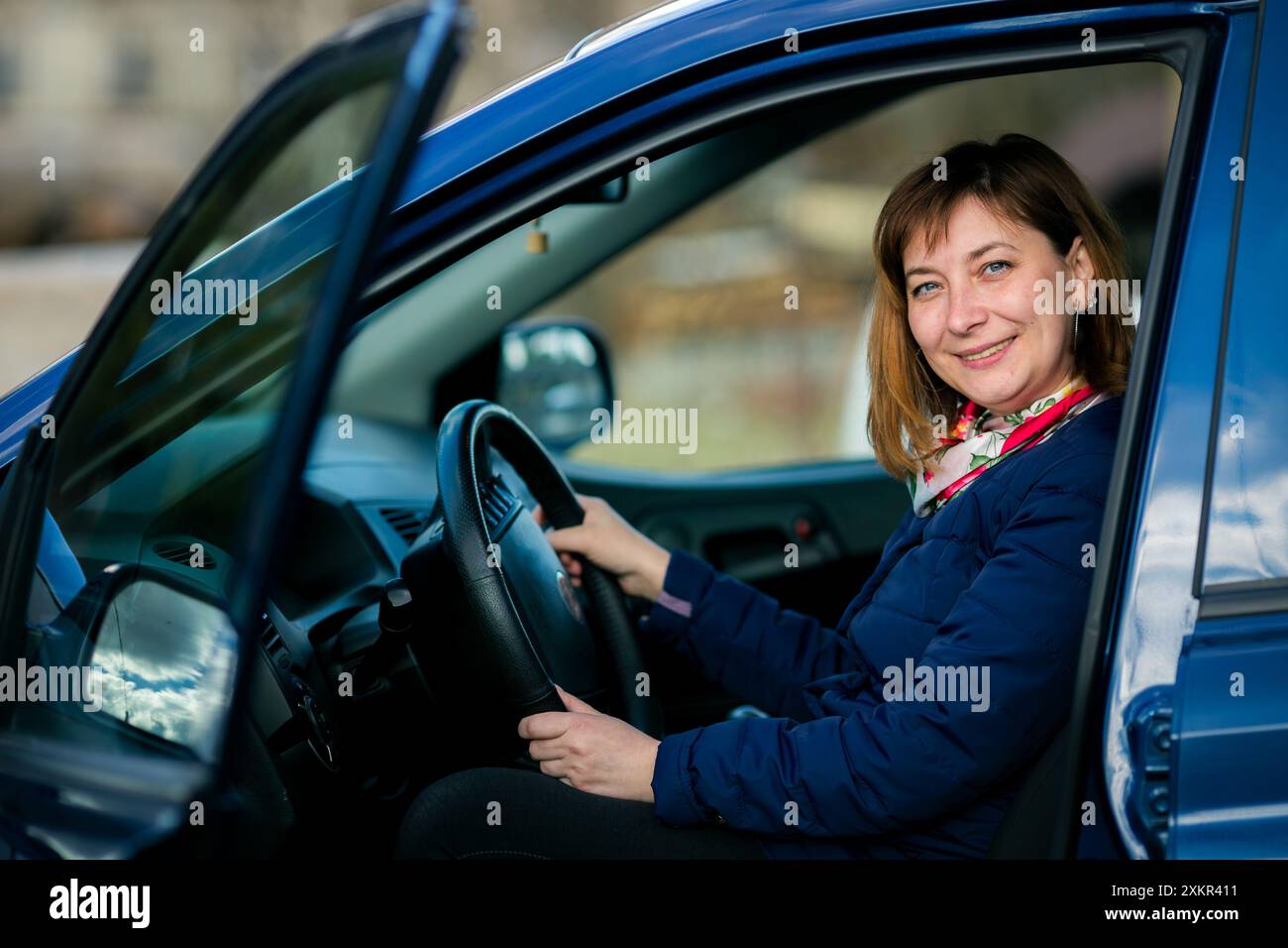 Portrait woman behind the wheel hi-res stock photography and images - Alamy