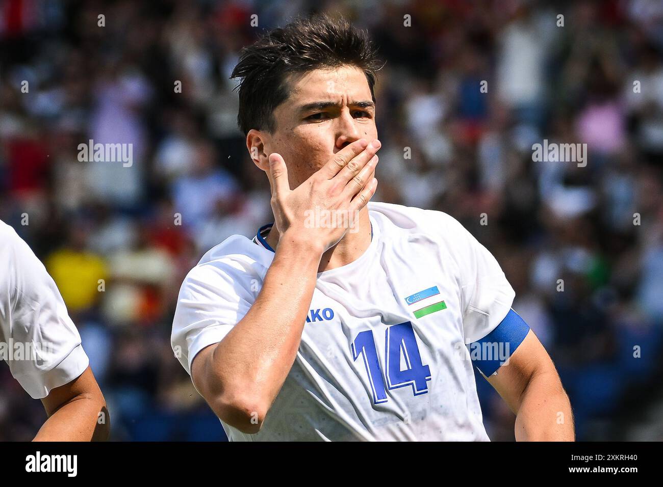 SHOMURODOV Eldor of Uzbekistan celebrates his goal during the football