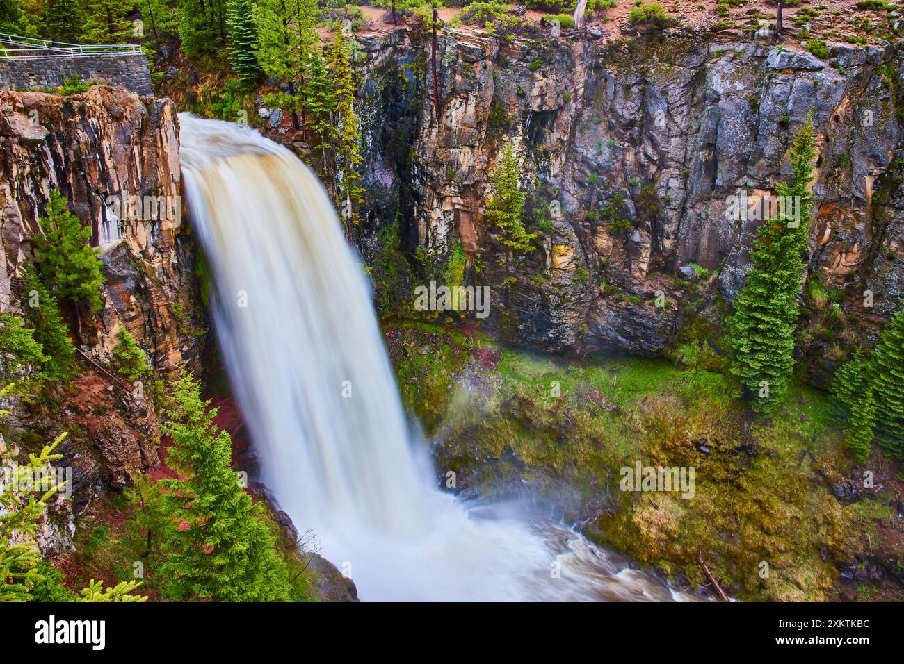 Majestic Tumalo Falls Cascading Over Cliff in Forested Landscape Aerial ...