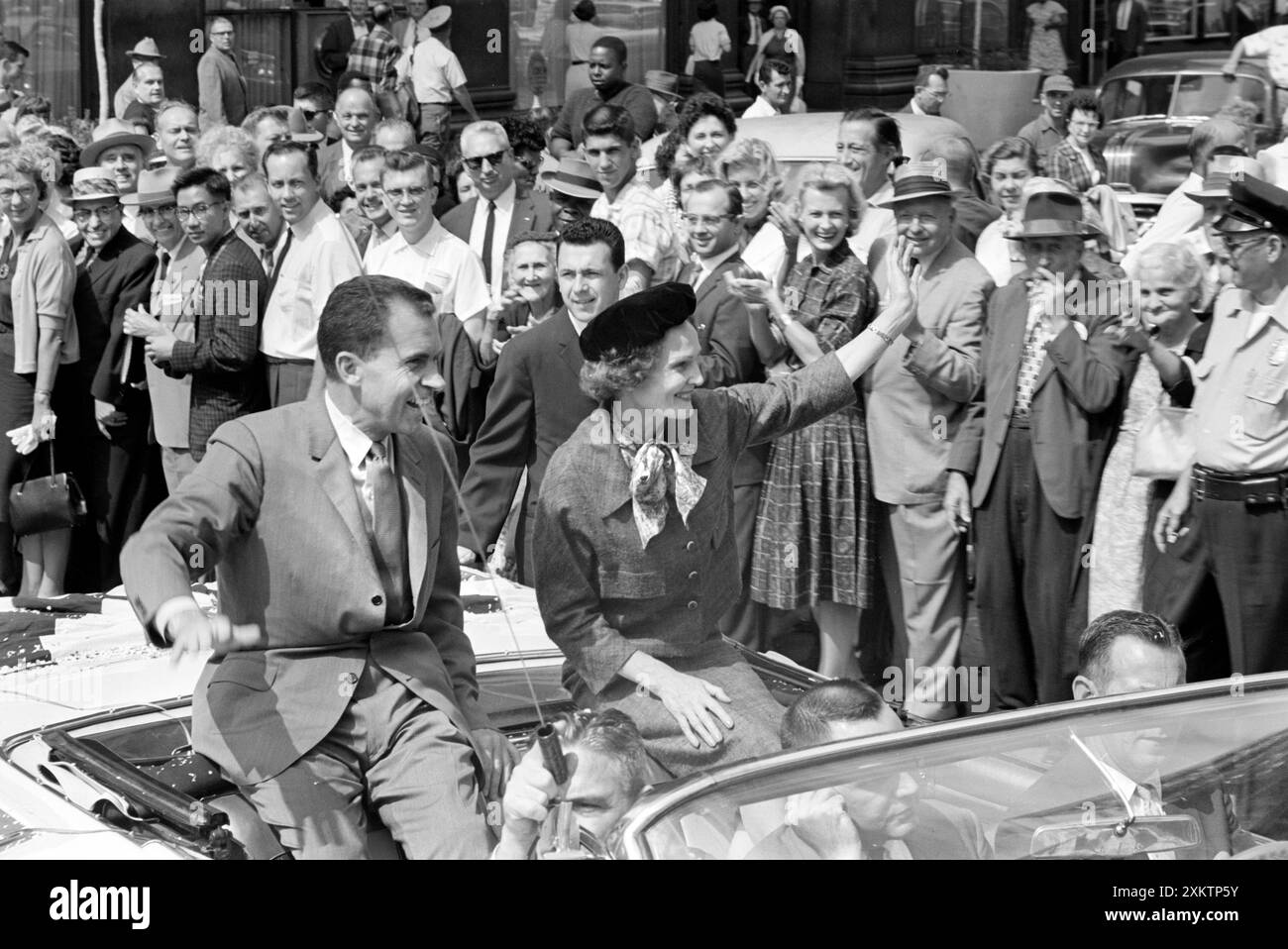 U.S. Vice President Richard Nixon with his wife Pat Nixon wave to crowds while riding in open car during campaign trip, Indianapolis, Indiana, USA, Thomas J. O'Halloran, U.S. News & World Report Magazine Photograph Collection, September 14, 1960 Stock Photo