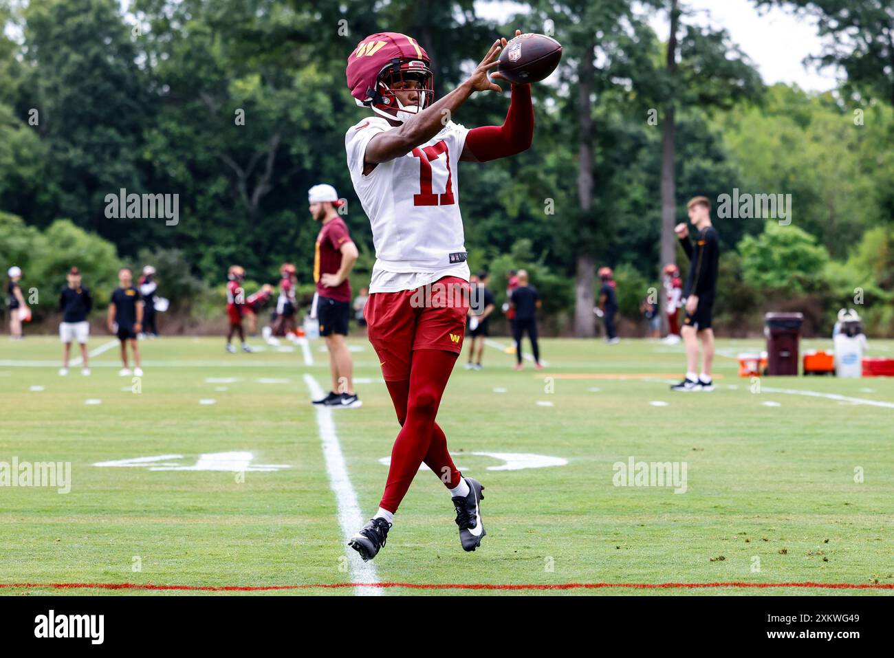 Washington Commanders wide receiver Terry McLaurin (17) makes a catch during day one of training