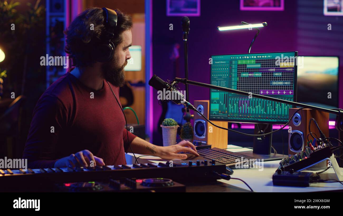 Musician pressing keys adjusting controls hi-res stock photography and ...