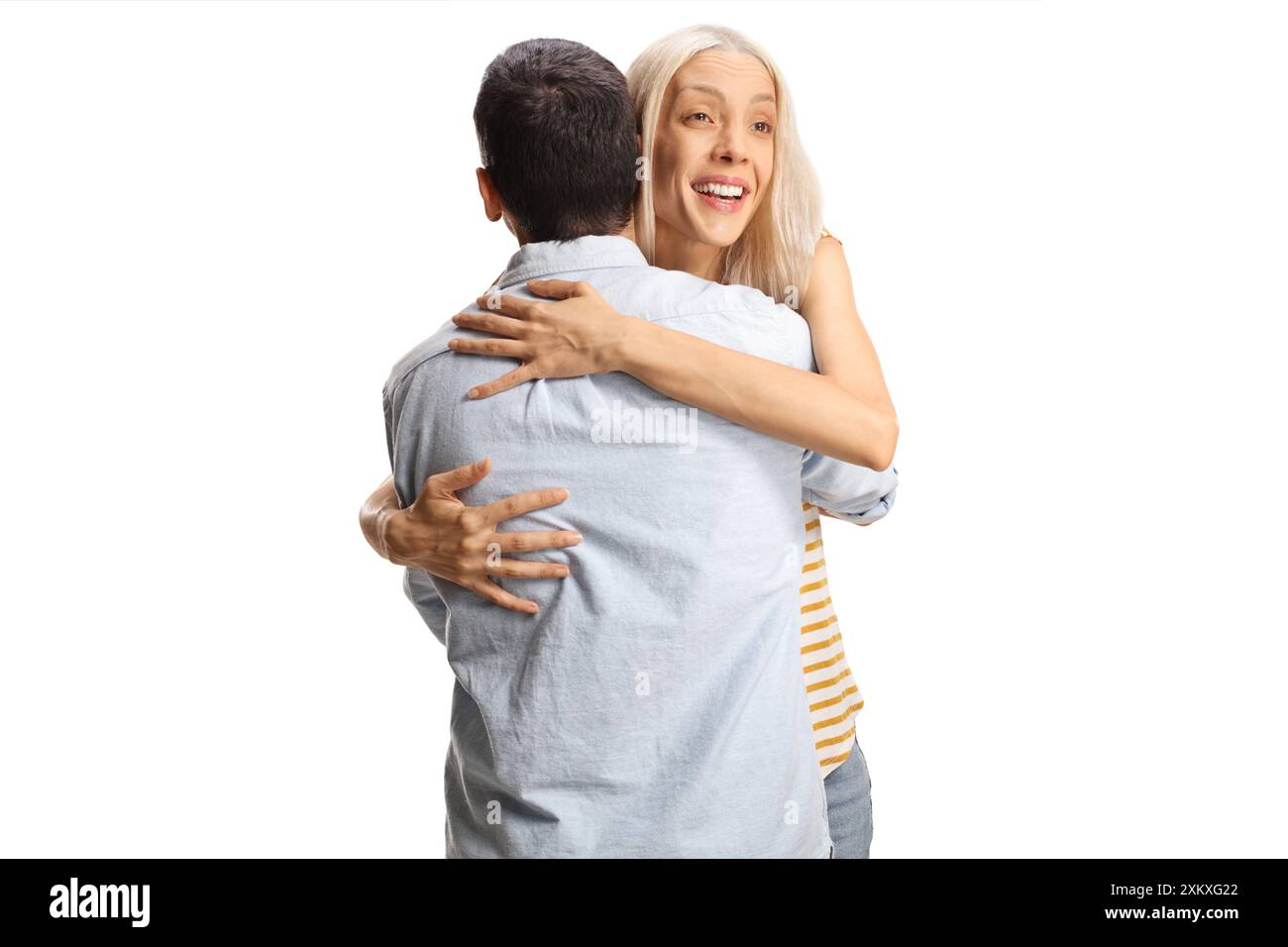 Happy young woman hugging a man isolated on white background Stock ...