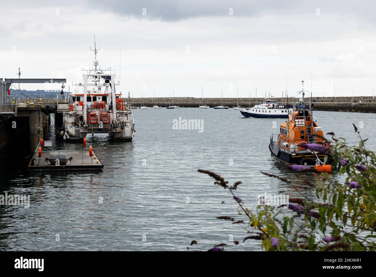 Irish coast guard boat and lifeboat at the RNLI station in Dun ...