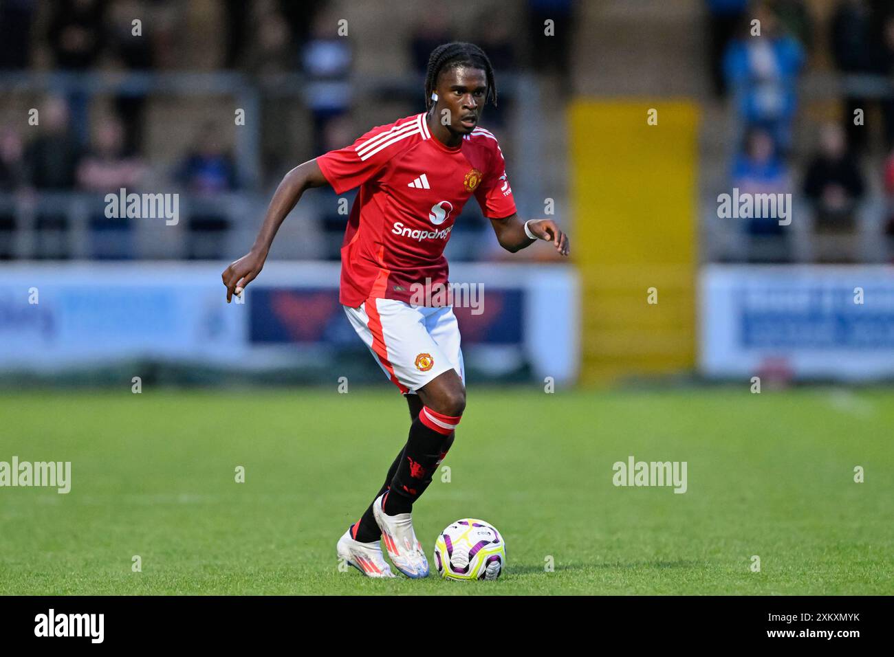 Jaydan Kamason of Manchester United in action during the Pre-season friendly match Chester vs Manchester United at Deva Stadium, Chester, United Kingdom, 24th July 2024  (Photo by Cody Froggatt/News Images) Stock Photo