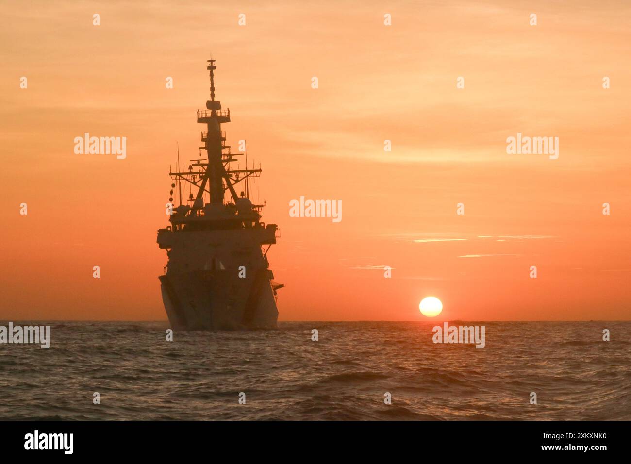 Coast Guard Cutter Stone steams in the Atlantic Ocean at sunset, July 1 ...