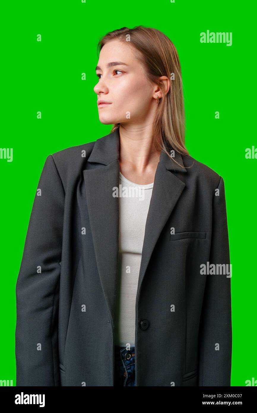 Model Looking Off Camera Woman Wearing Black Blazer Looking Off Camera Against Green Screen ...