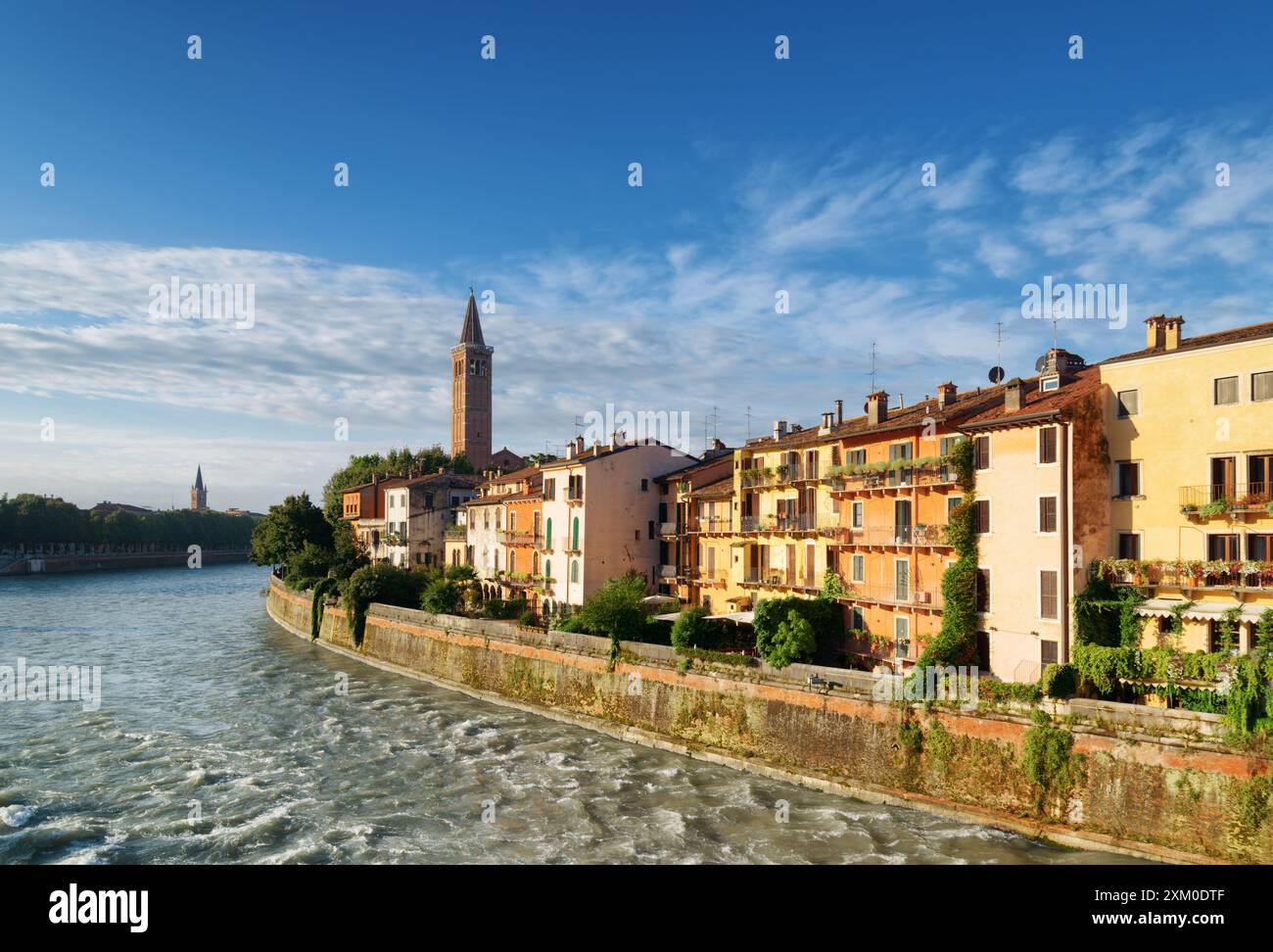 Facades of old houses on waterfront of Adige River in Verona Stock ...