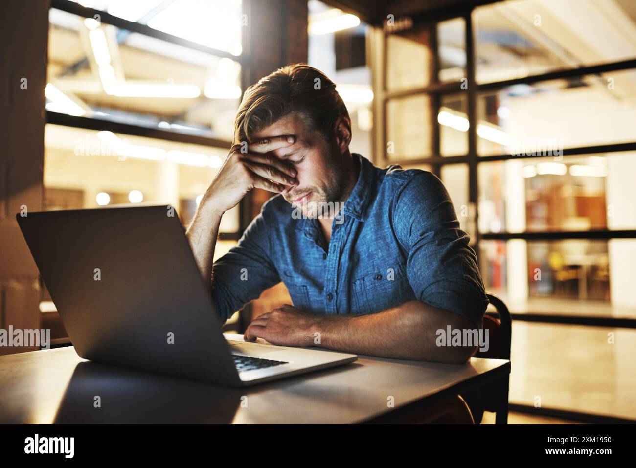 Tired male programmer working late hi-res stock photography and images ...