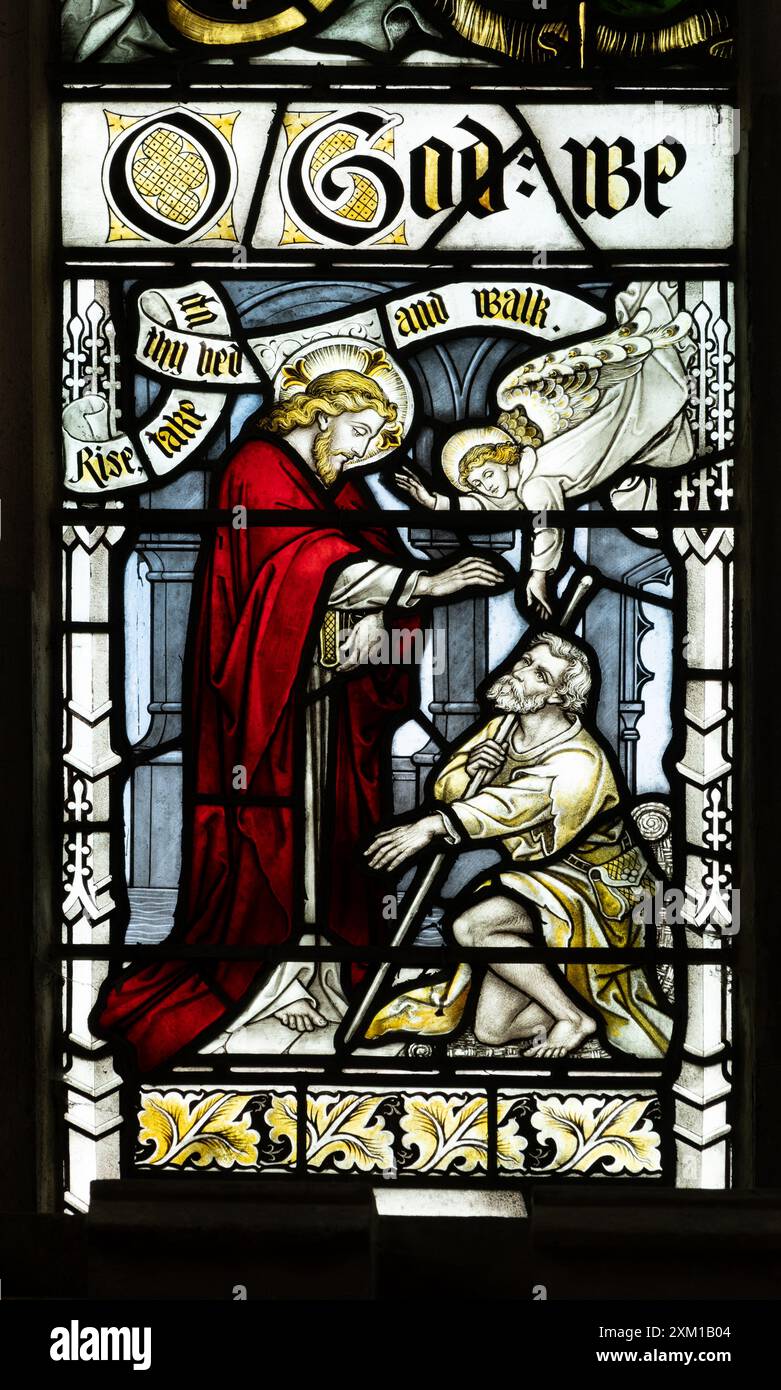 Christ healing the cripple stained glass, All Saints Church, Stretton on Dunsmore, Warwickshire, England, UK Stock Photo
