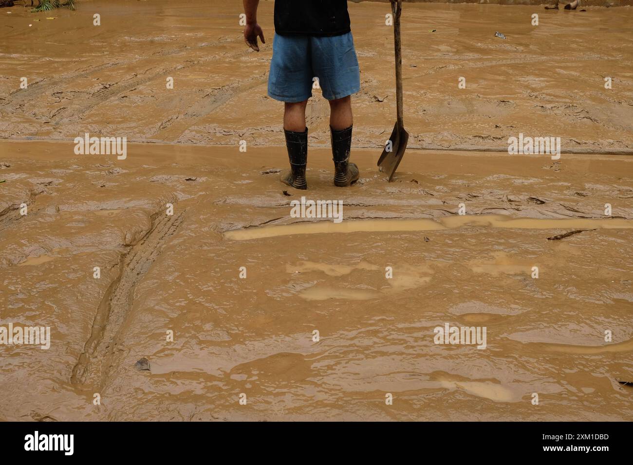 On July 25, 2024, residents of Marikina, Philippines, clean their homes, salvage products and personal belongings ruin by dirt and mud after heavy rain and flooding from Typhoon Gaema, locally named Carina. Copyright: xDeoxMontesclarosx Stock Photo