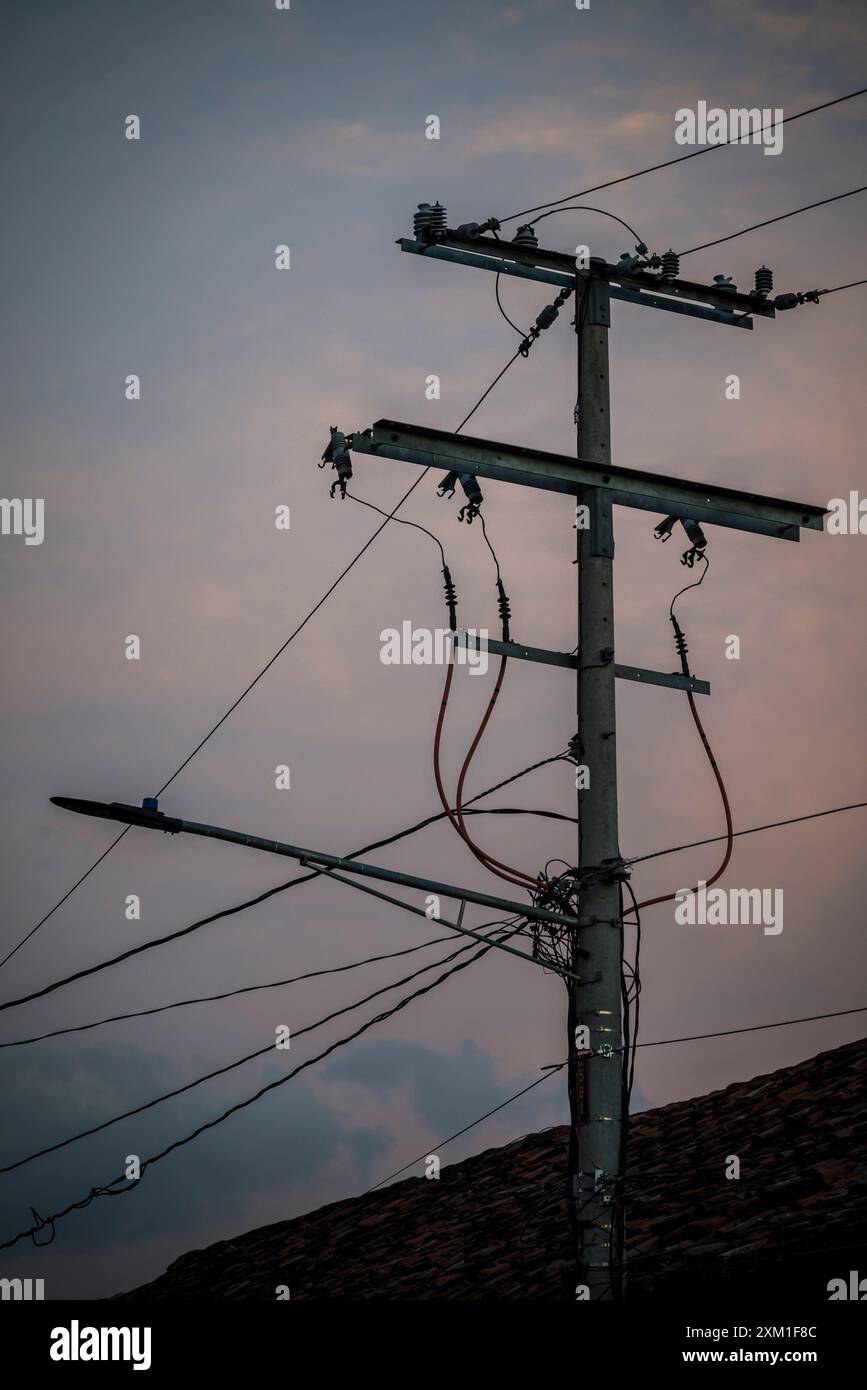 Electricity cables against twilight sky,, Granada, Nicaragua Stock Photo