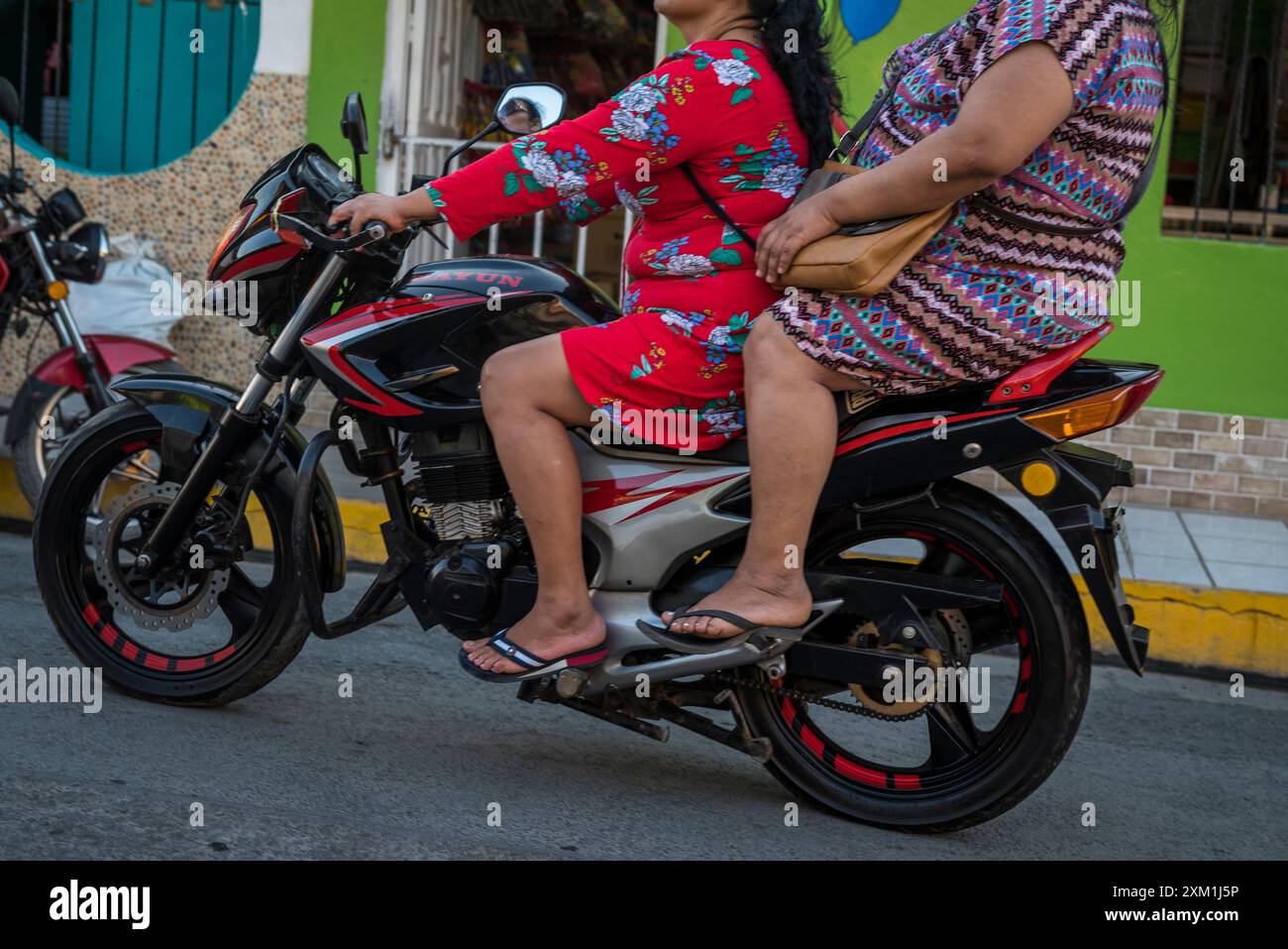 Two middle-aged women on a motorbike, Ometepe island, Lake Nicaragua,  Rivas Department, Nicaragua Stock Photo