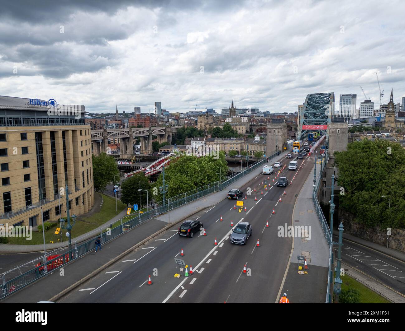 Aerial shot of the Tyne Bridge, showcasing the ongoing roadworks that have reduced traffic to one lane. The image captures the construction activity a Stock Photo