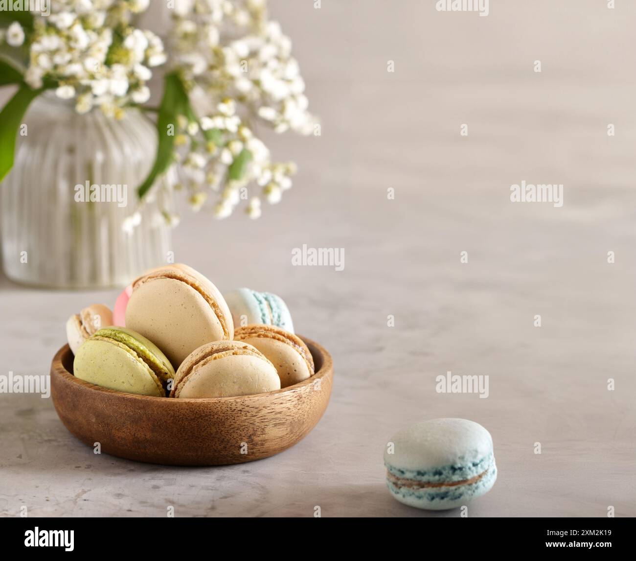 macaroons for dessert in a bowl on the table Stock Photo