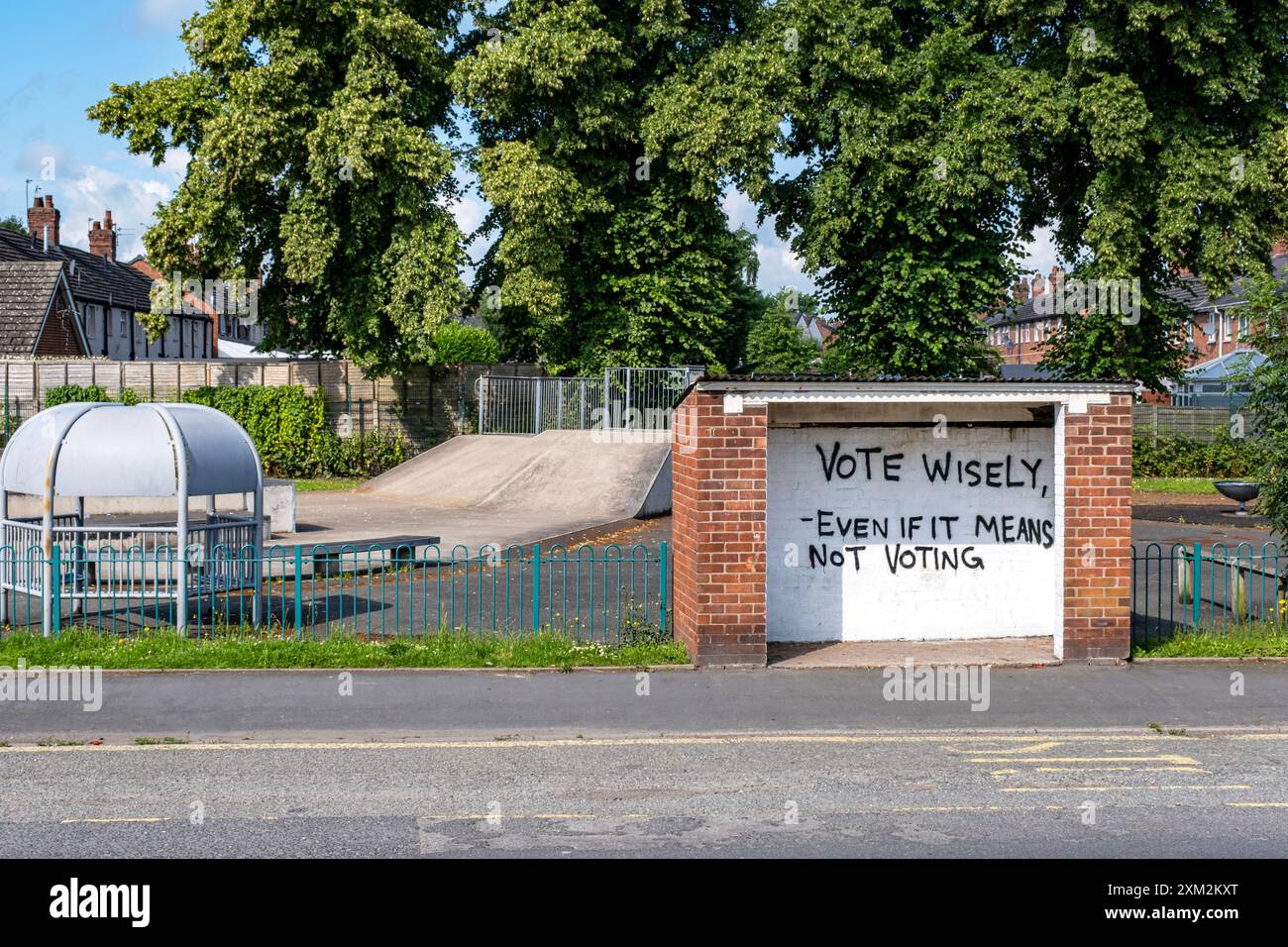 Vote wisely, voting advice painted in bus stop Stock Photo