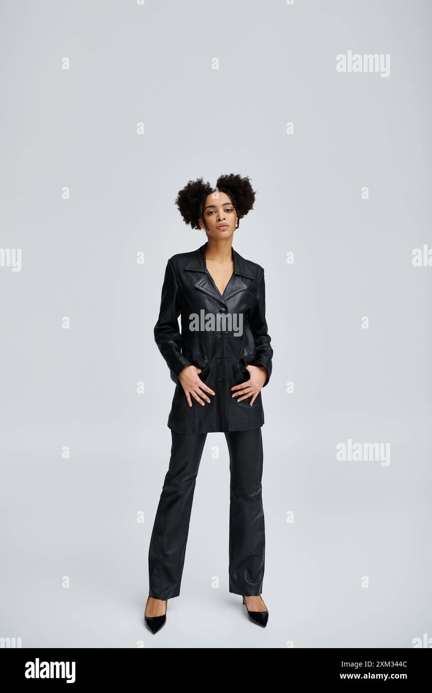 Black woman in leather pants hi-res stock photography and images - Alamy