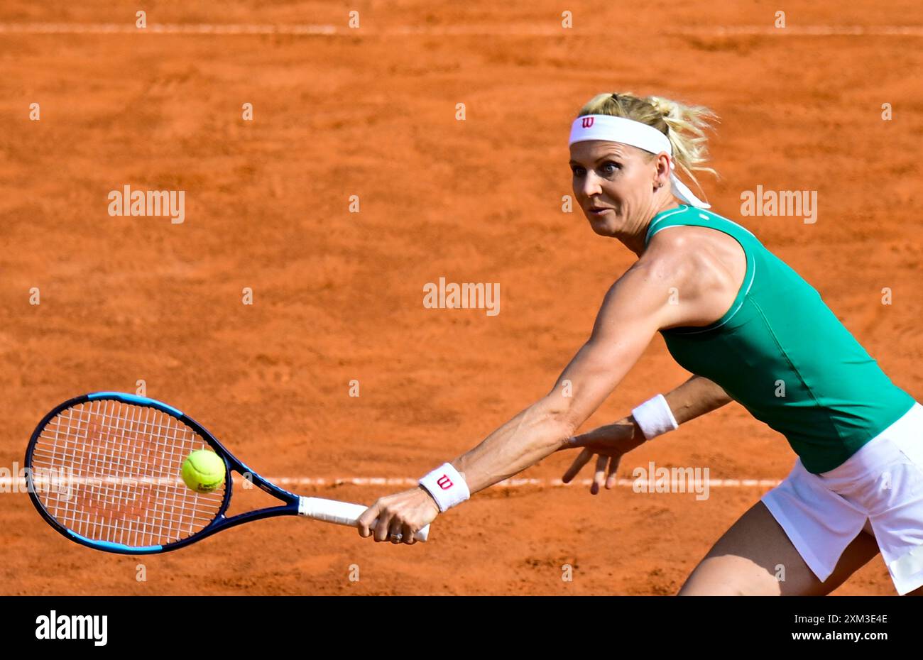 Prague, Czech Republic. 25th July, 2024. Czech Lucie Safarova (pictured) and Bethanie Mattek-Sands of USA in action against Camilla Rosatello of Italy and Kimberley Zimmermann of Belgium during woman´s doubles semi-final of the WTA women's tennis tournament Livesport Prague Open 2024 in Prague, Czech Republic, July 25, 2024. Credit: Roman Vondrous/CTK Photo/Alamy Live News Stock Photo