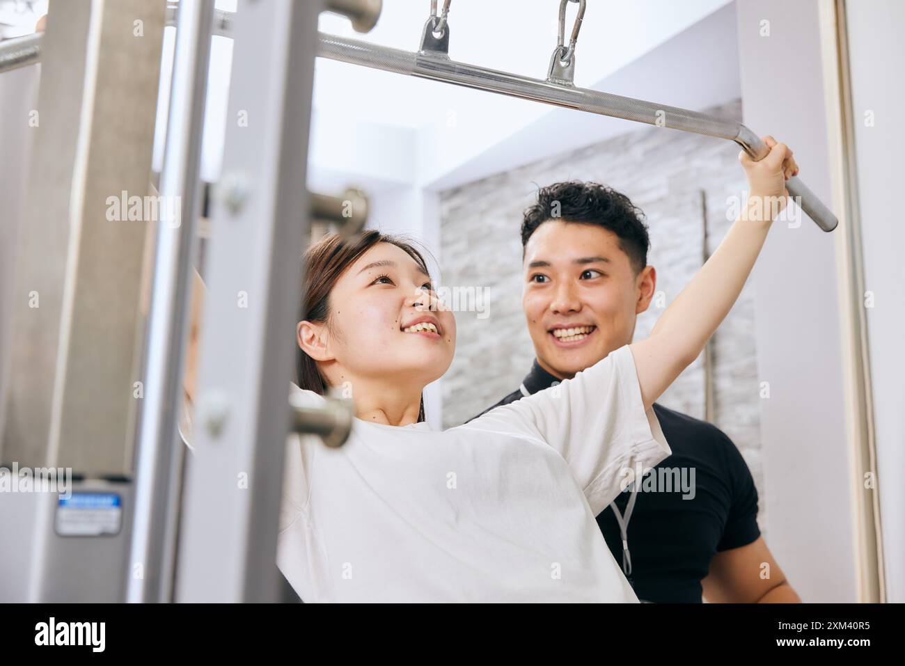 Japanese woman standing gym smiling hi-res stock photography and images ...
